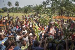 Lucien Ambunga, a Catholic priest and the Pastor of Itipo returns home to his parishioners in Itipo village after surviving Ebola.